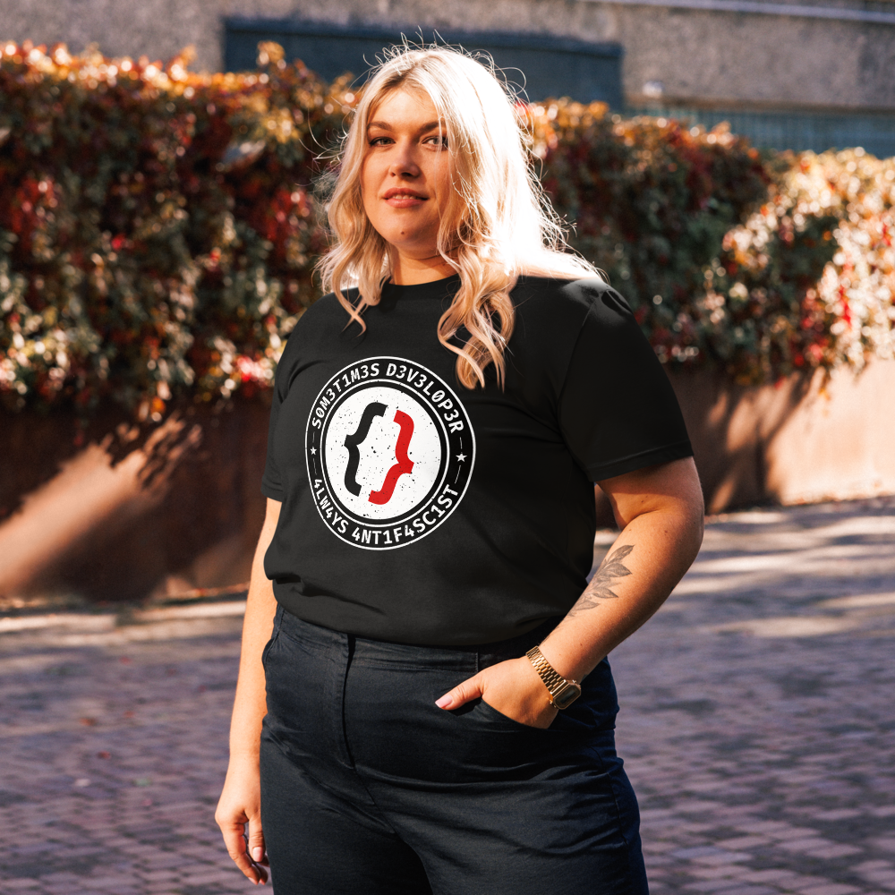 Image of a woman with a black t-shirt with the text 'S0M3T1M3S D3V3L0P3R, 4LW4YS 4NT1F4SC1ST' written in circle that contains a curly brackets white and red